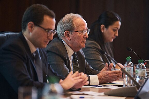 Professor Juan E. Méndez (middle) in discussion with Dr Pablo Gavira Díaz (left) and Natia Navrouzov (right)