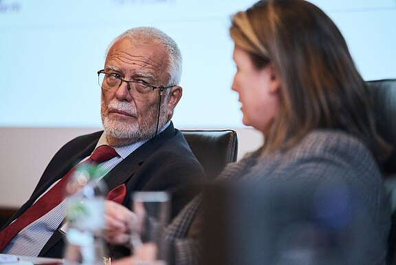 Professor Piotr Hofmański (left) in discussion with Marie O’Leary (right)