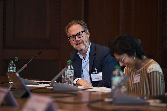 Professor Gerry Simpson (left) and Professor Neha Jain (right)
