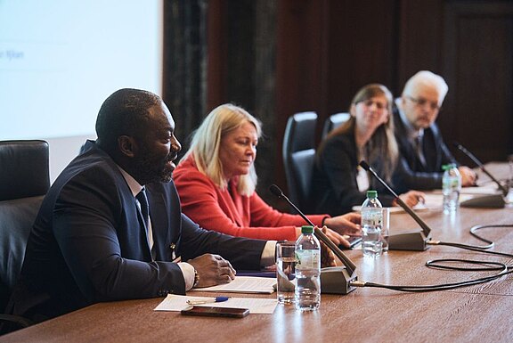 From left to right: Dr Ousman Njikam, Päivi Kaukoranta, Dr Emma Brandon and Judge Mykola Gnatovskyy