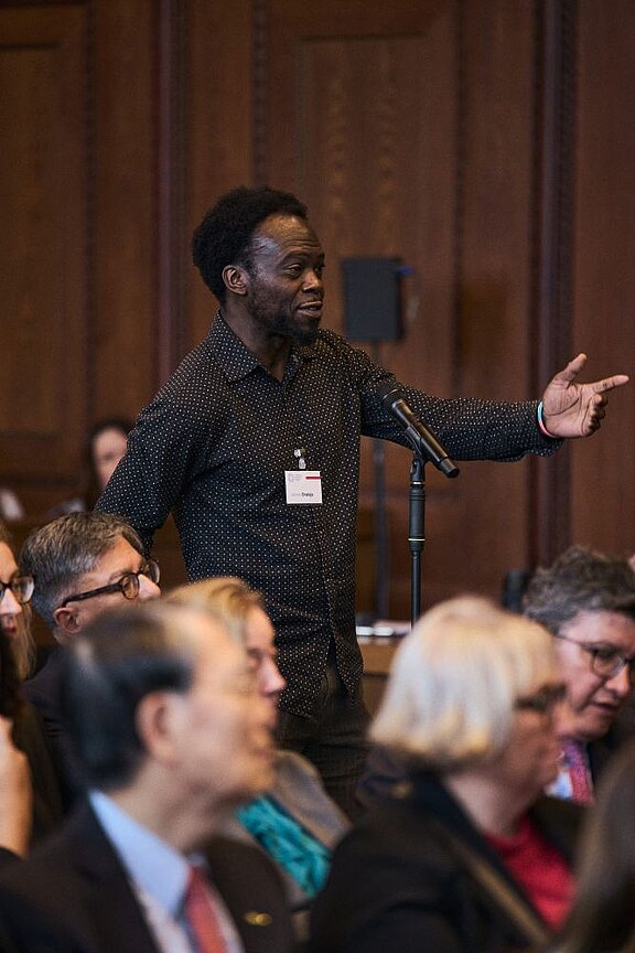 One of the guests asking a question
